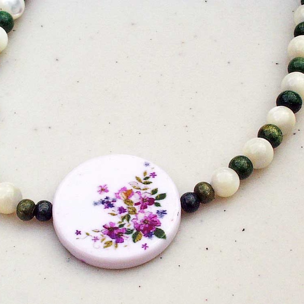 FLOWER BOUQUET ON WHITE DISK NECKLACE, WHITE GENUINE PEARLS DARK GREEN BEADS,
